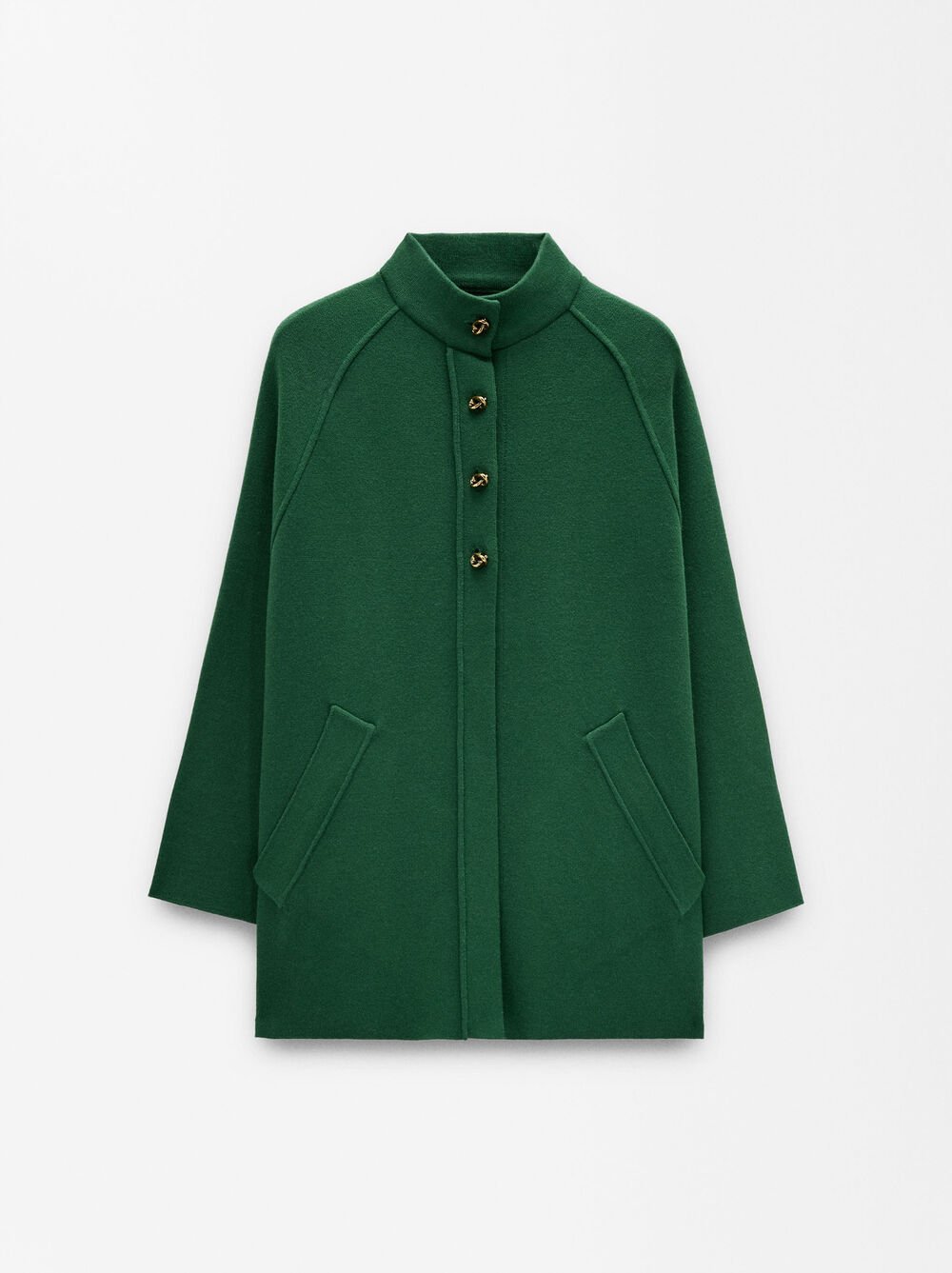 Poncho de malha com gola alta