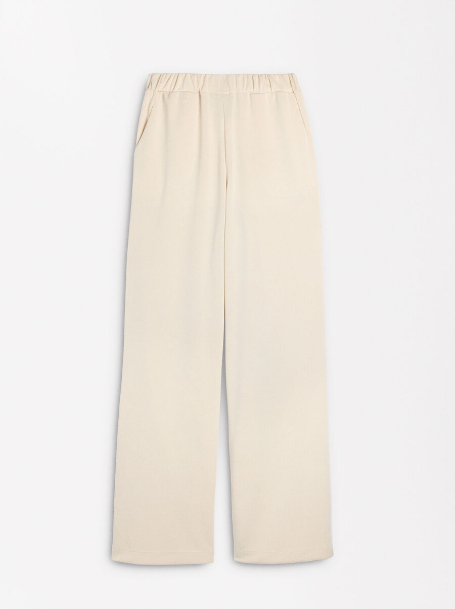 Loose-fitting trousers with elastic waistband