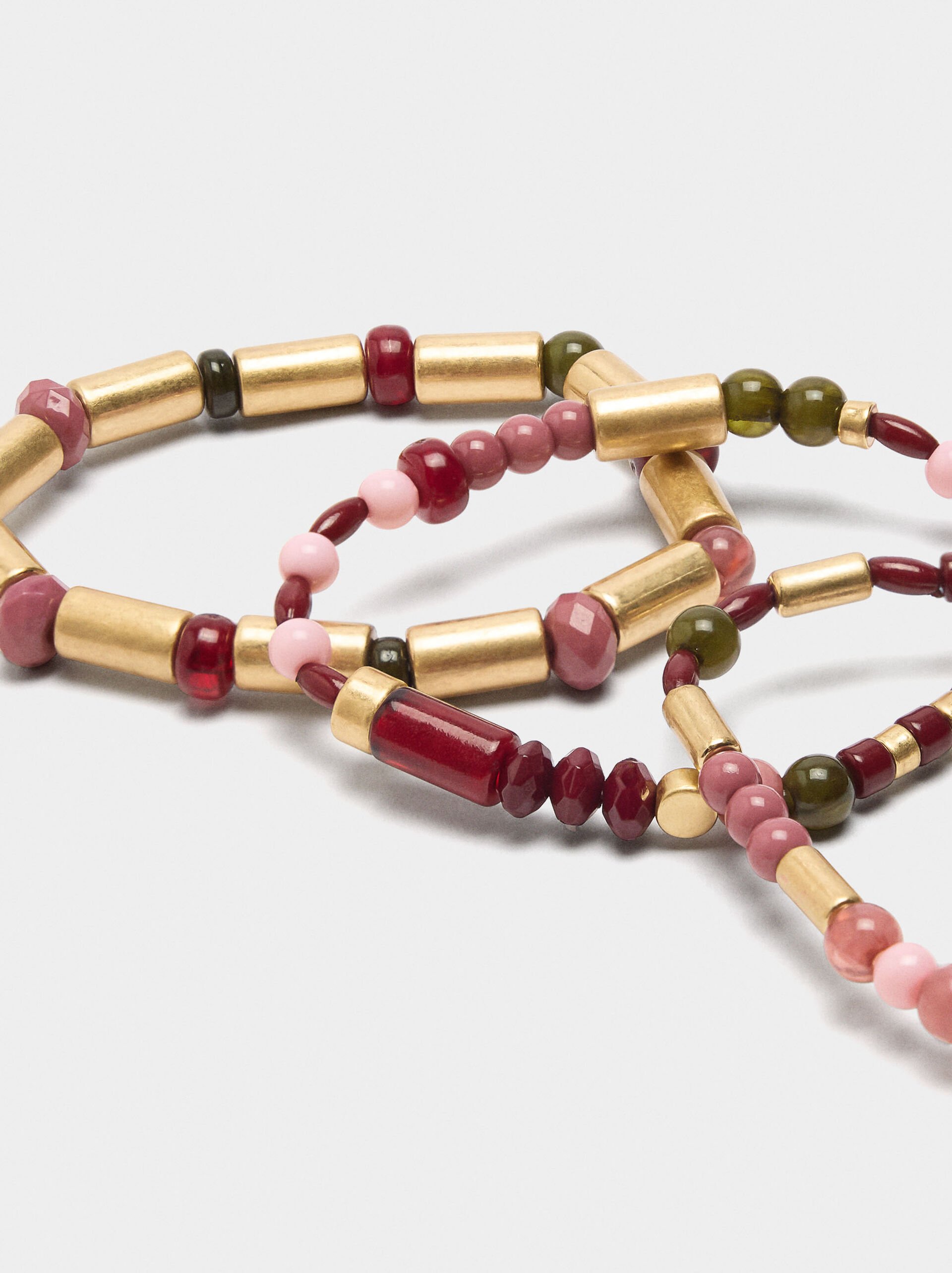 Set of elastic bracelets with stone-effect beads image number 1.0