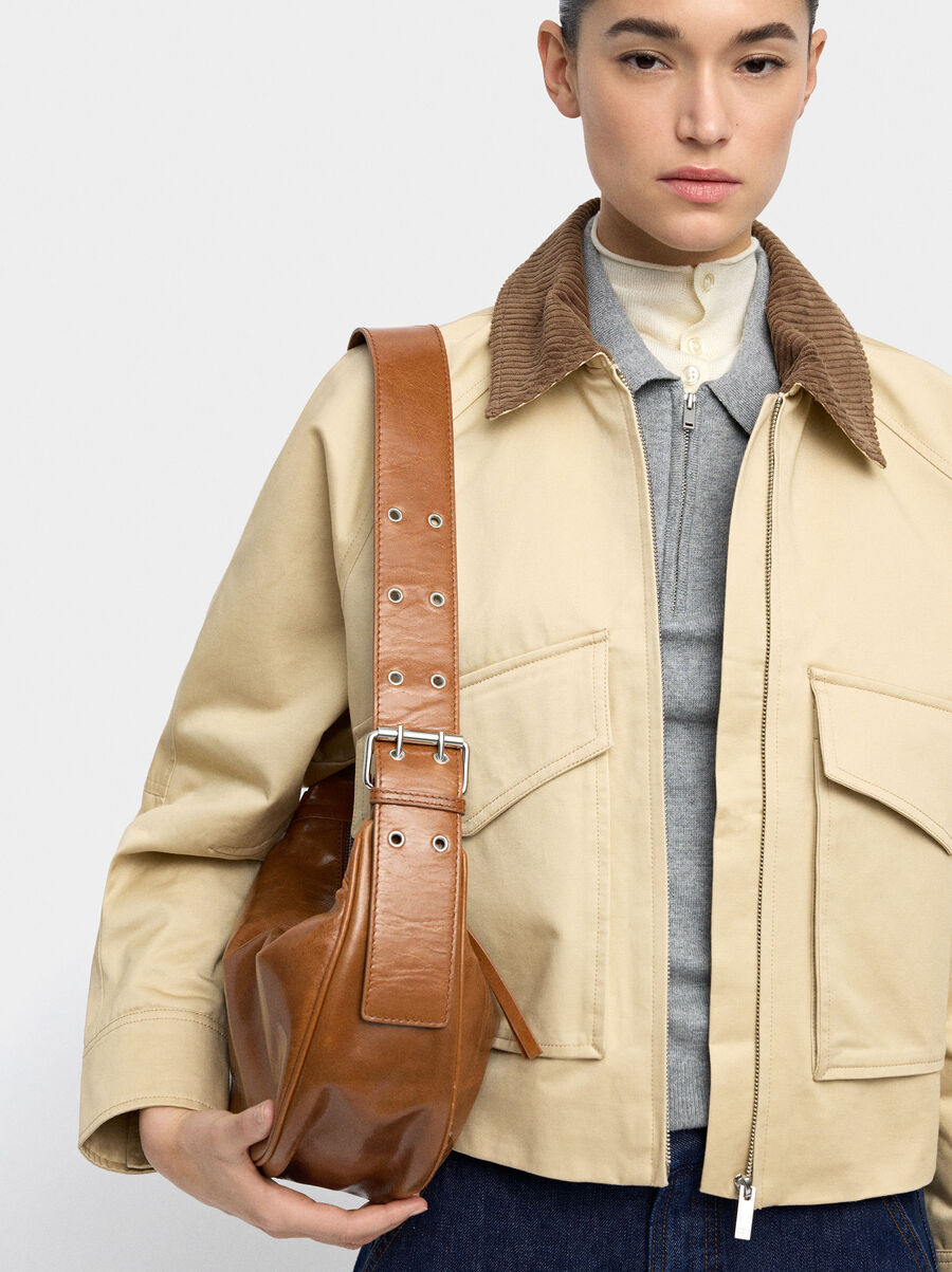 Leather hobo bag with studs