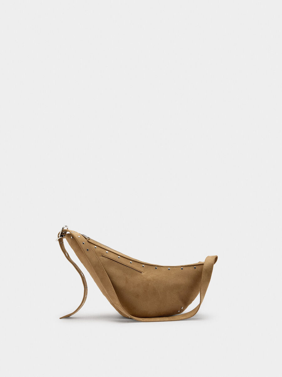 Asymmetric shoulder bag with studs