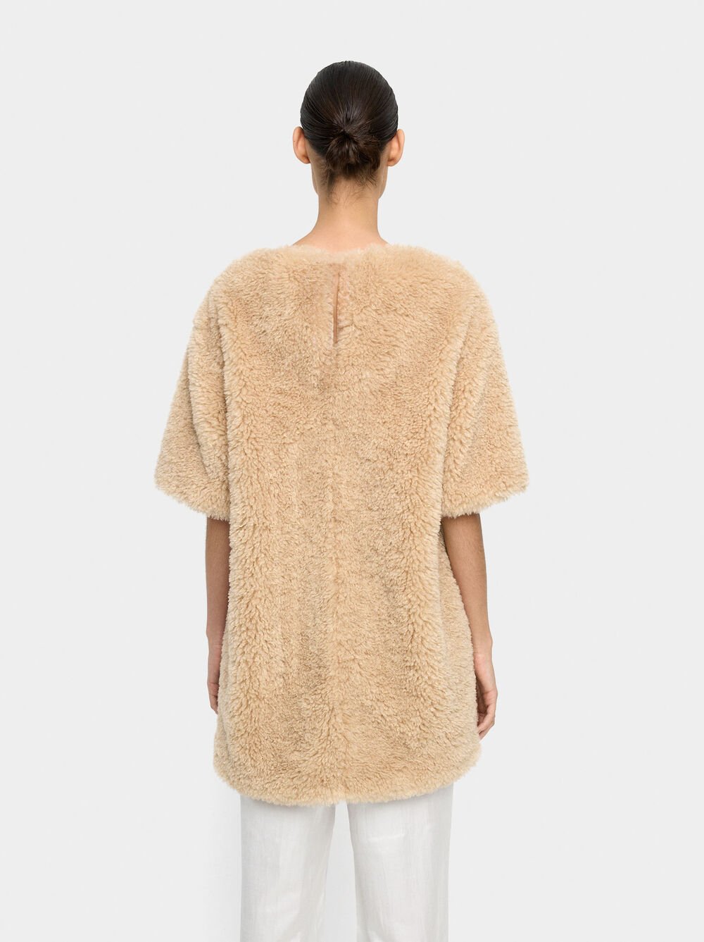 Short dress with leather-effect sheepskin