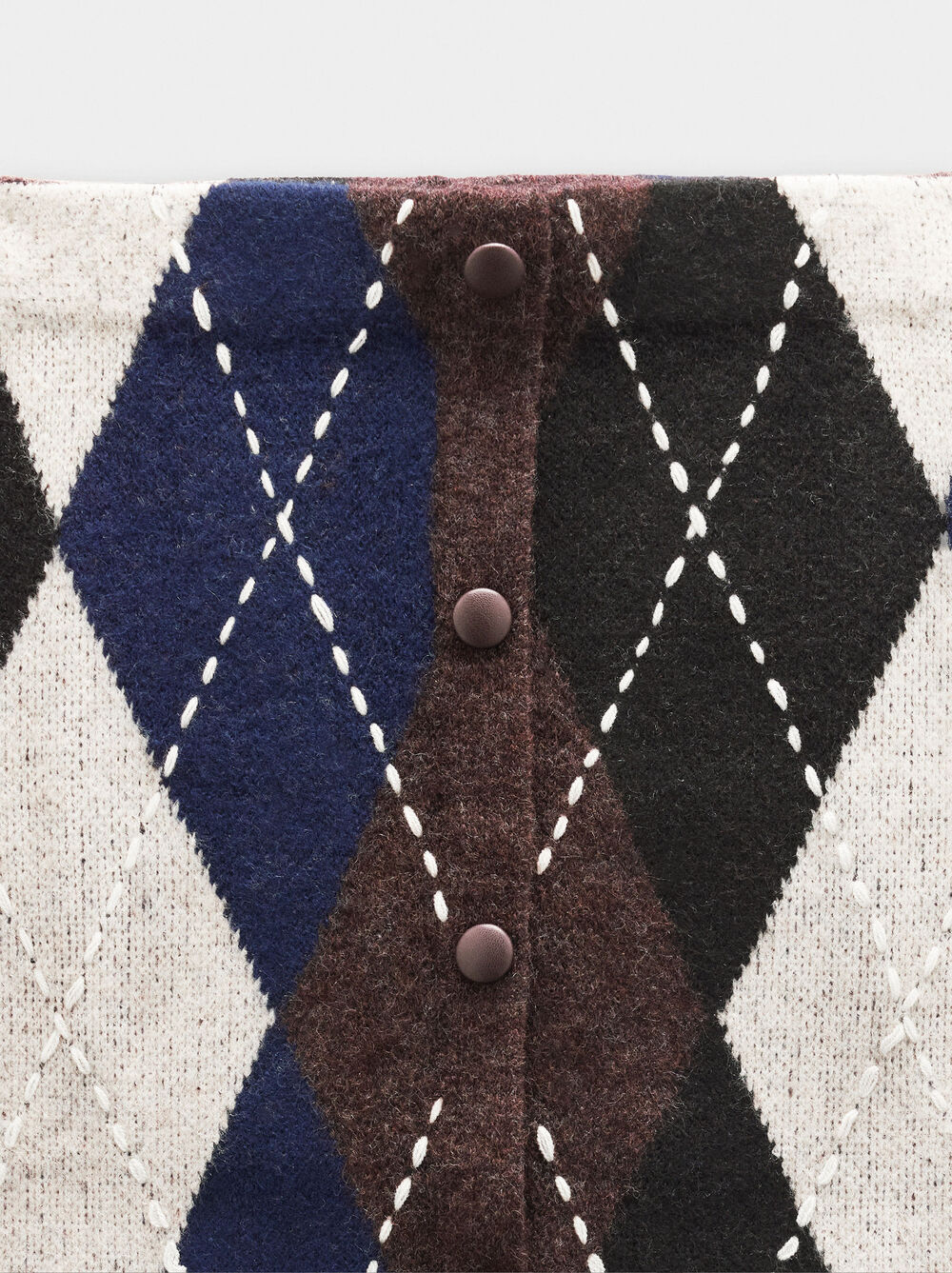 Jupe en maille avec losanges et broderie