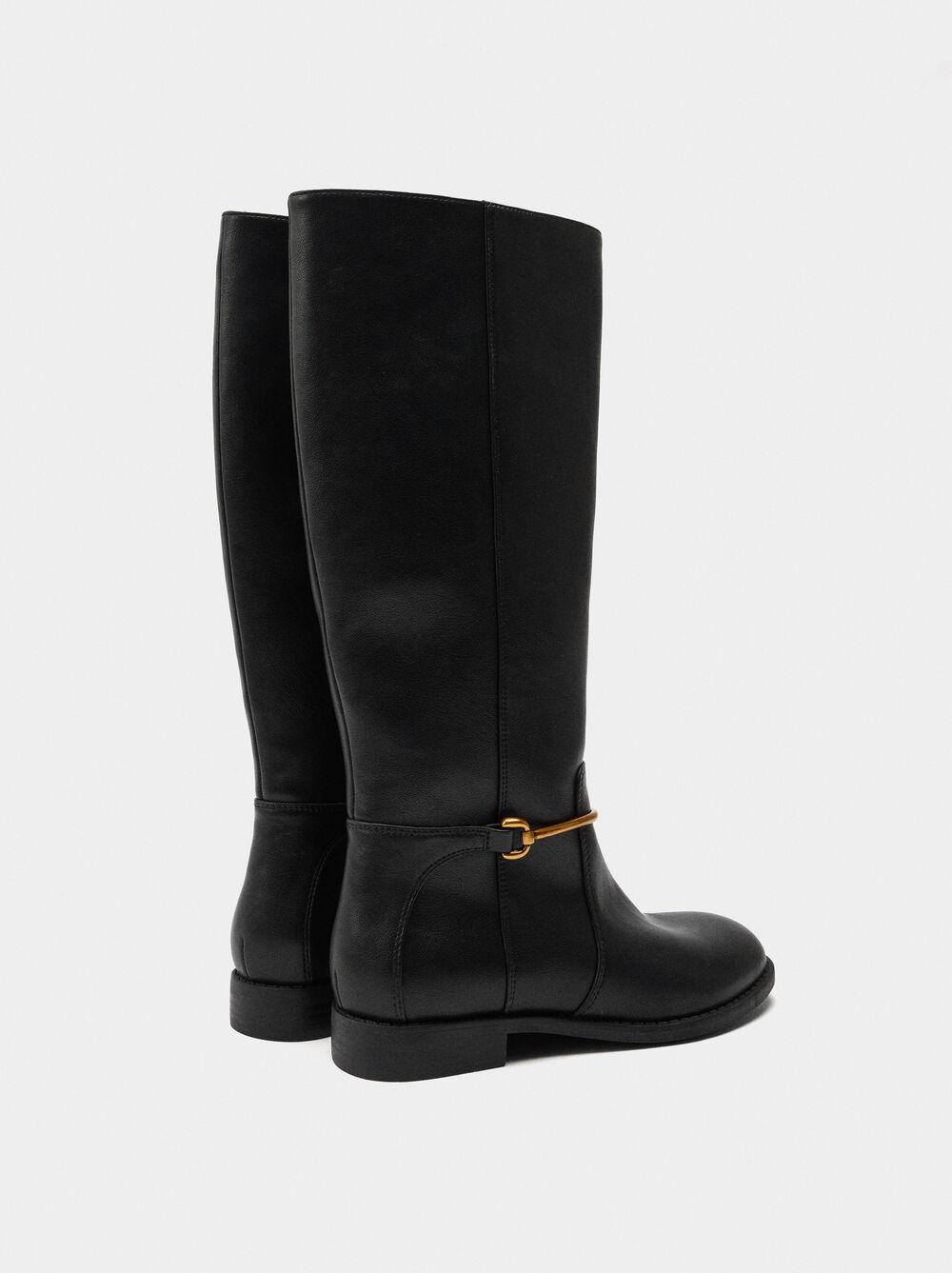 Bottes hautes avec détail métallique