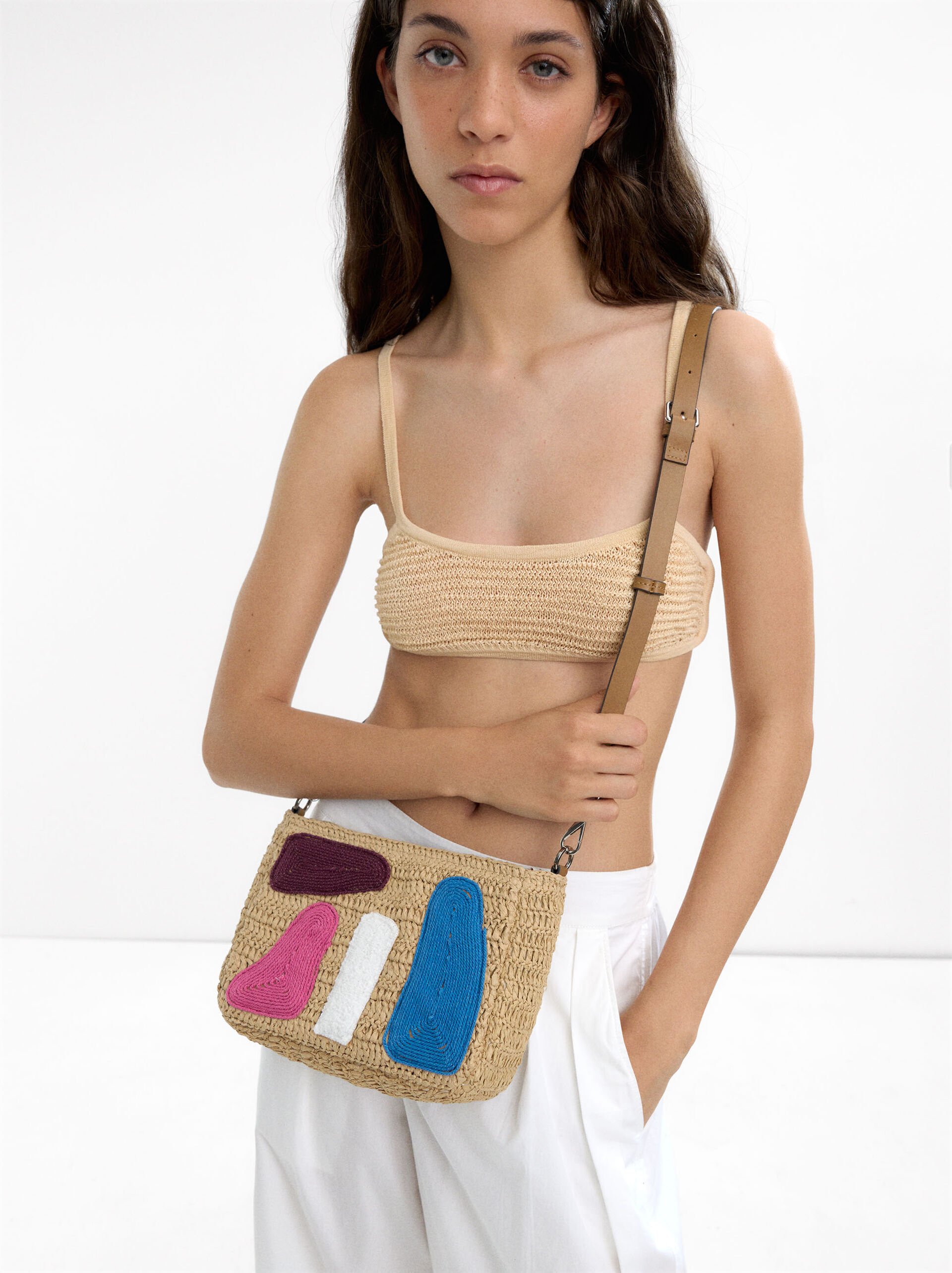 Crossbody bag with straw effect and multicolor applications image number 5.0