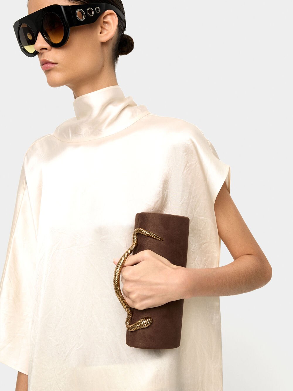 Cylindrical party bag with leather-effect