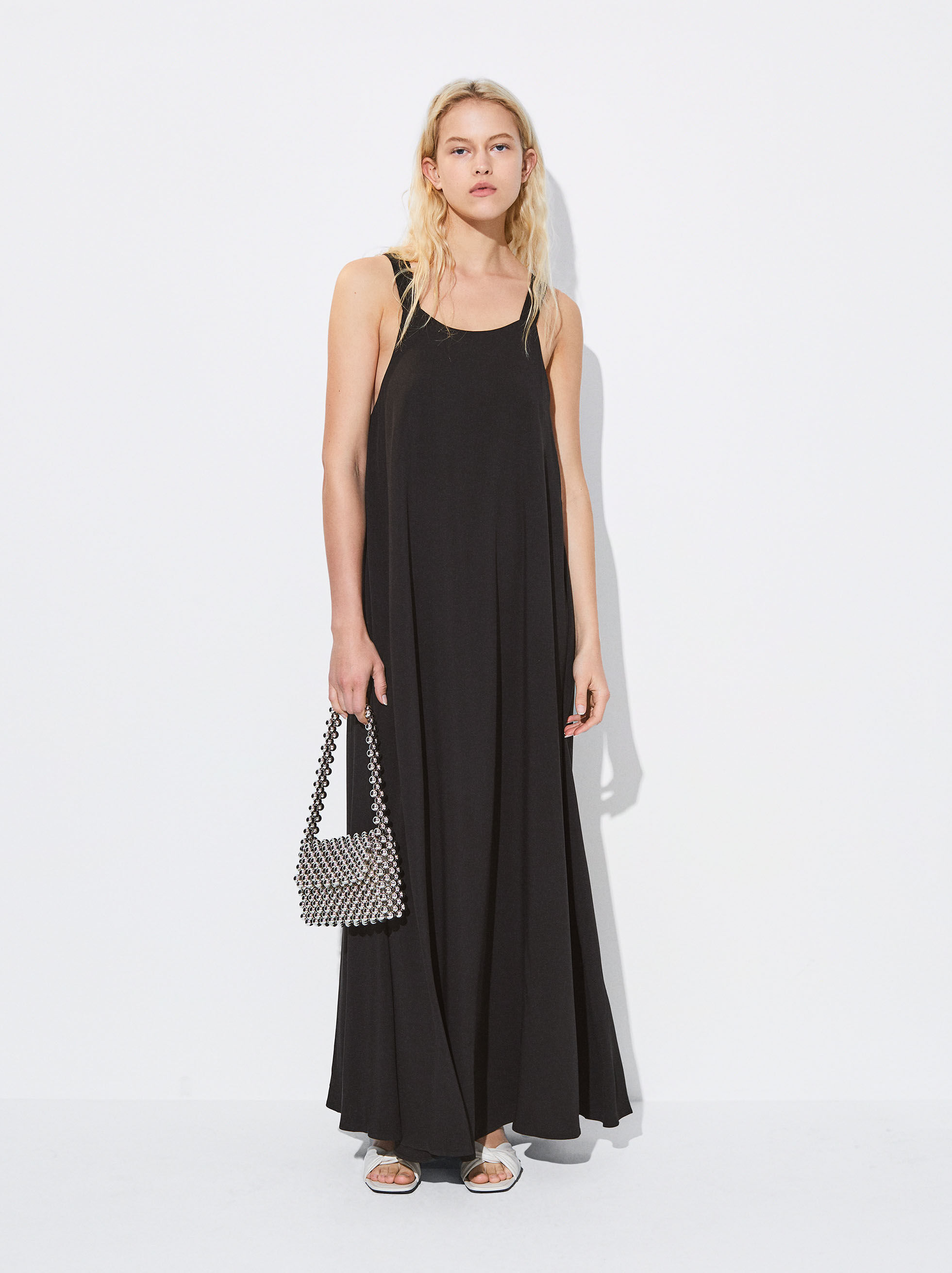 Long black strappy discount dress