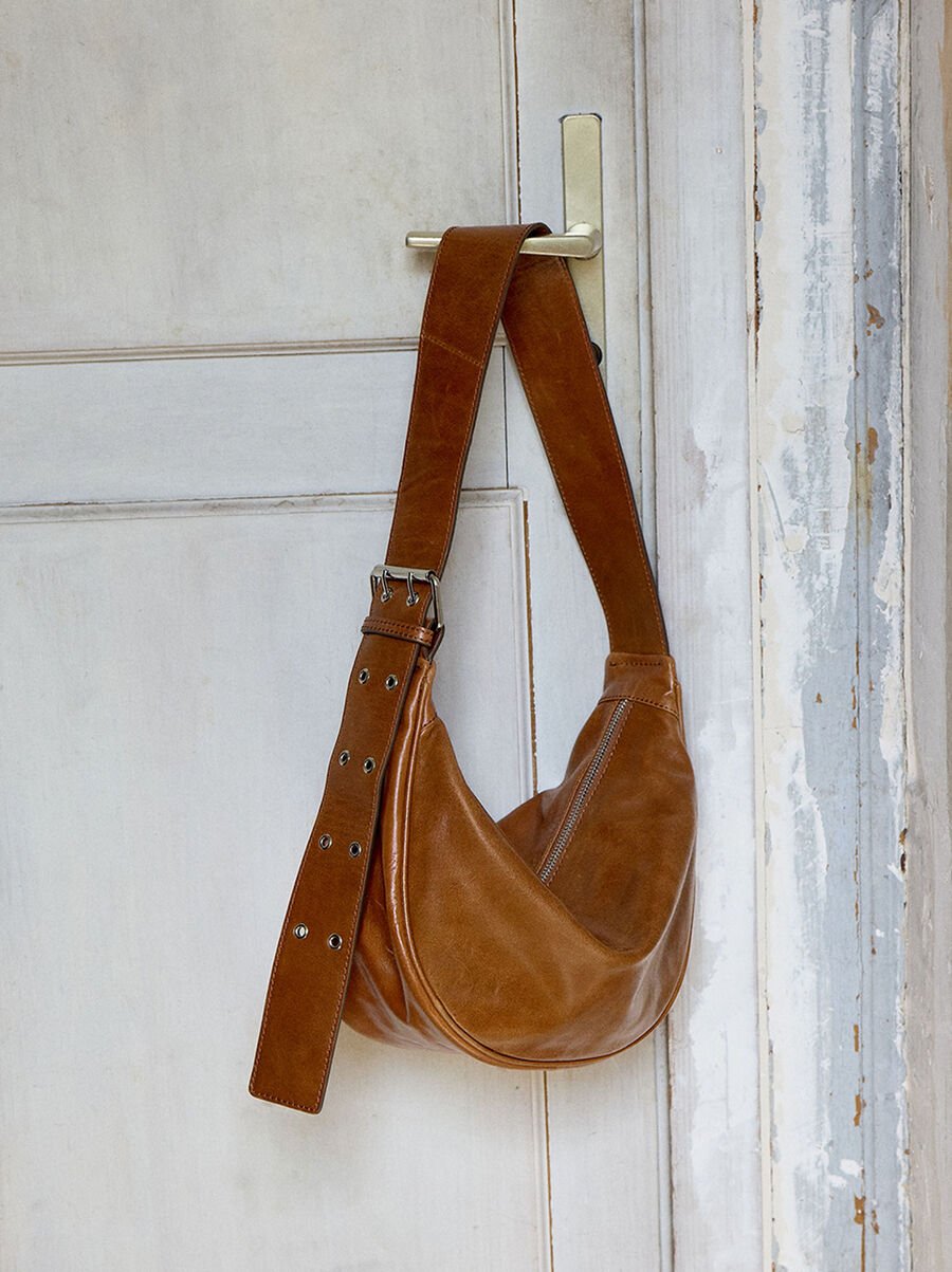 Leather hobo bag with studs
