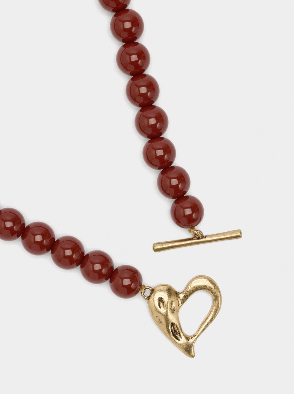 Collier court en perles effet pierre