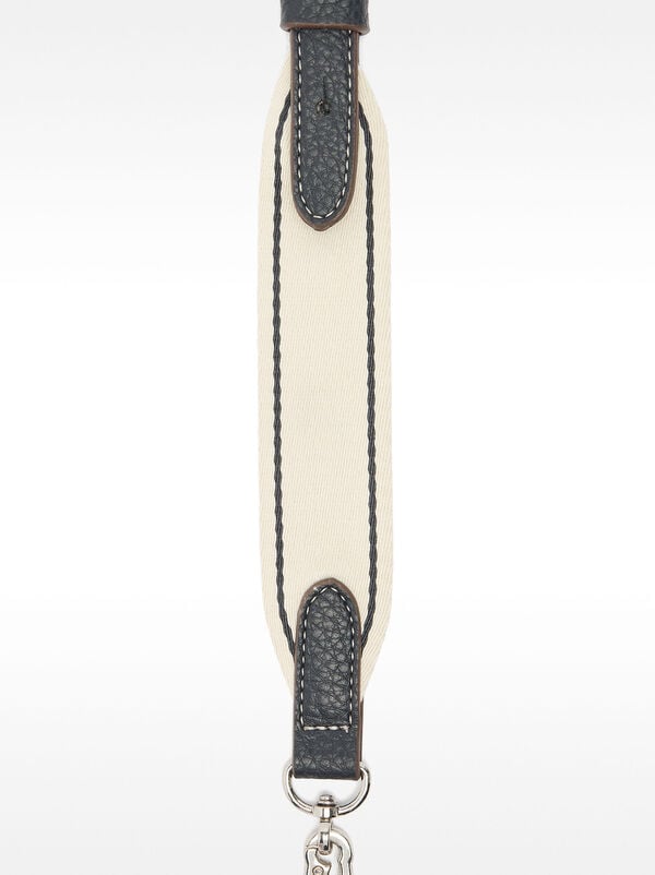 Crossbody bag with texture and flap closure