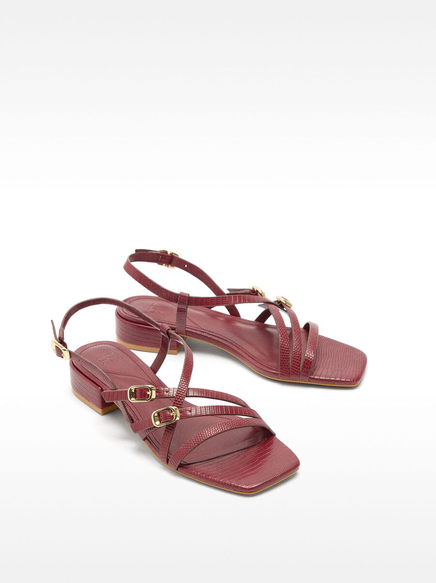 Sandalen mit Riemen in geprägtem Animalmuster