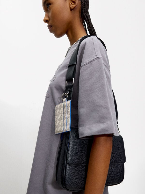 Crossbag with flap closure