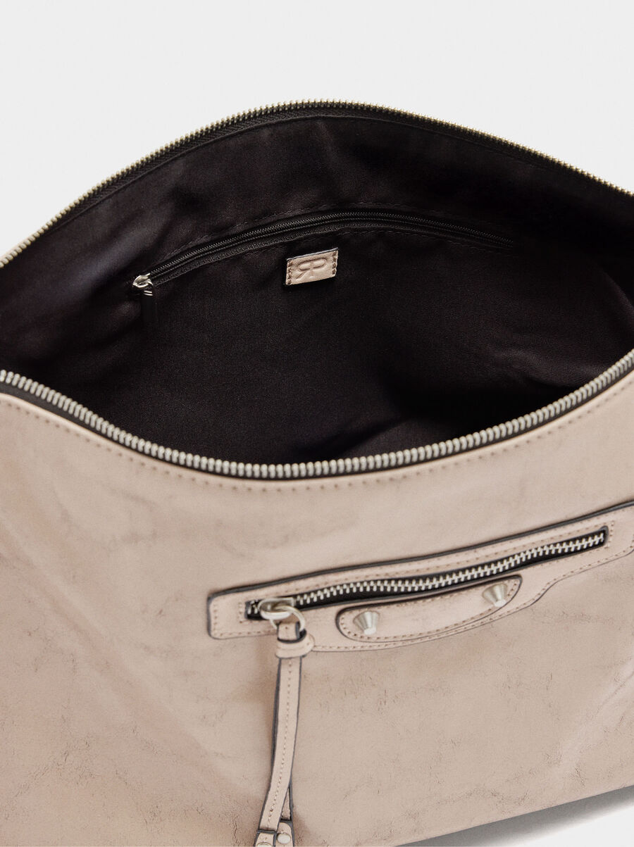 Handbag with aged effect