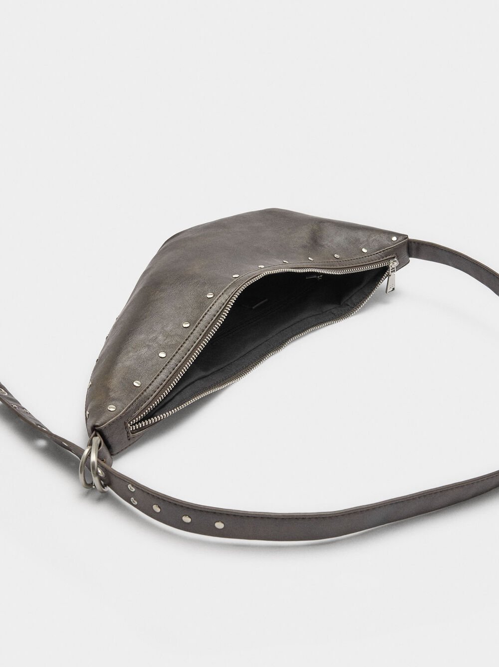 Asymmetric shoulder bag with studs