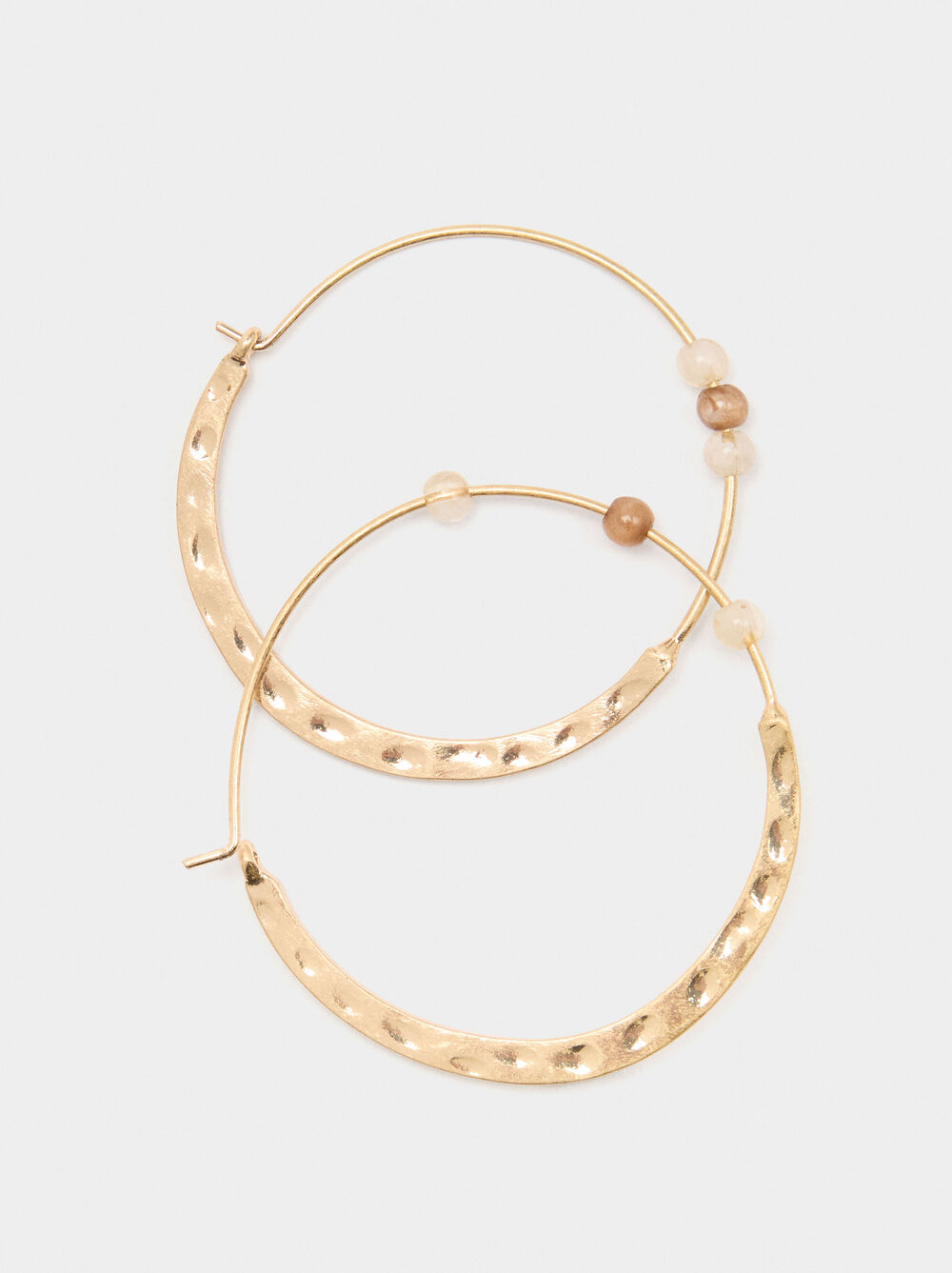 Flat hoop earrings with beads