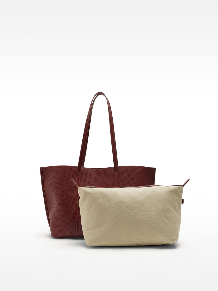 Perforated shopper bag with removable pouch