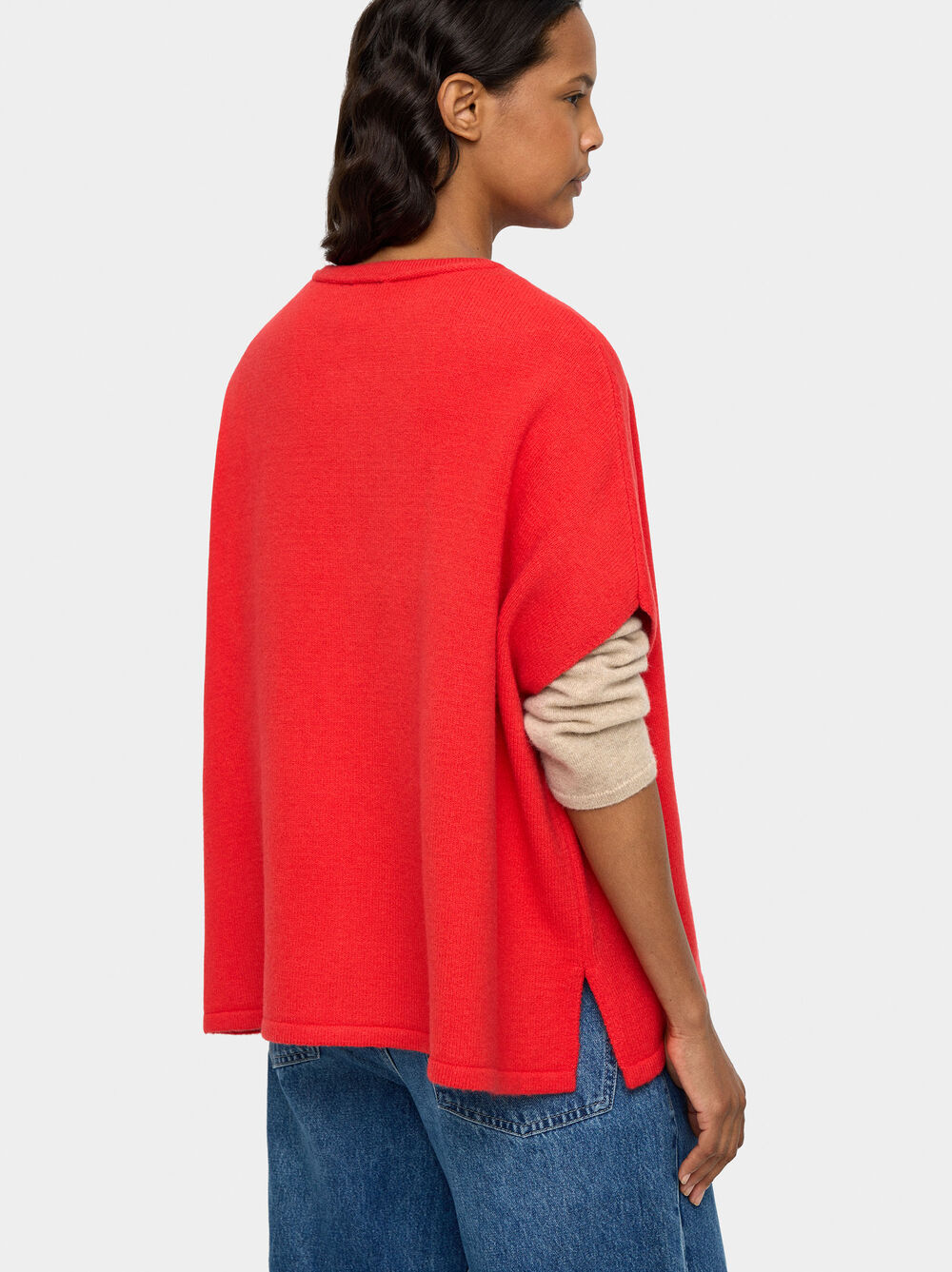 Poncho de malha com fivelas