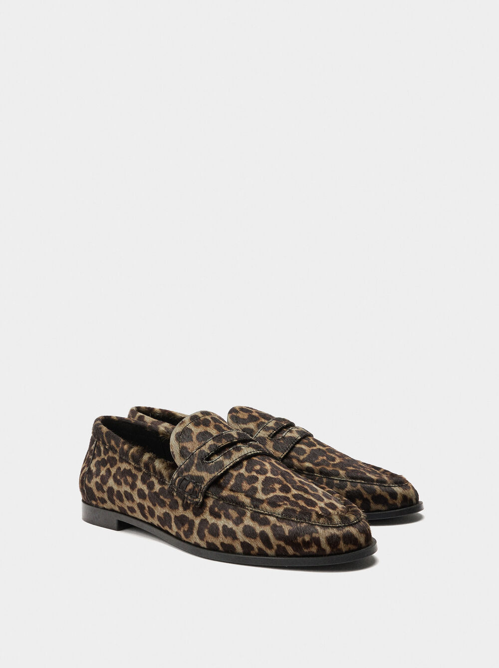Animal print leather moccasins