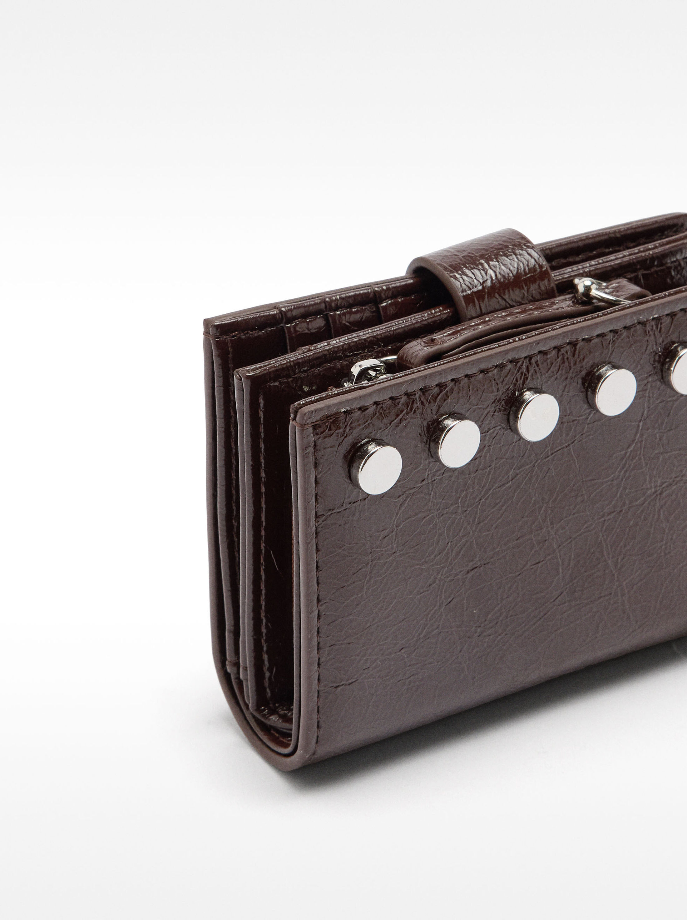 Wallet with cracked effect with studs image number 1.0