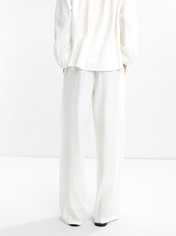 Trousers with linen elastic waistband