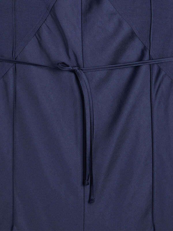 Dress with straps and seams