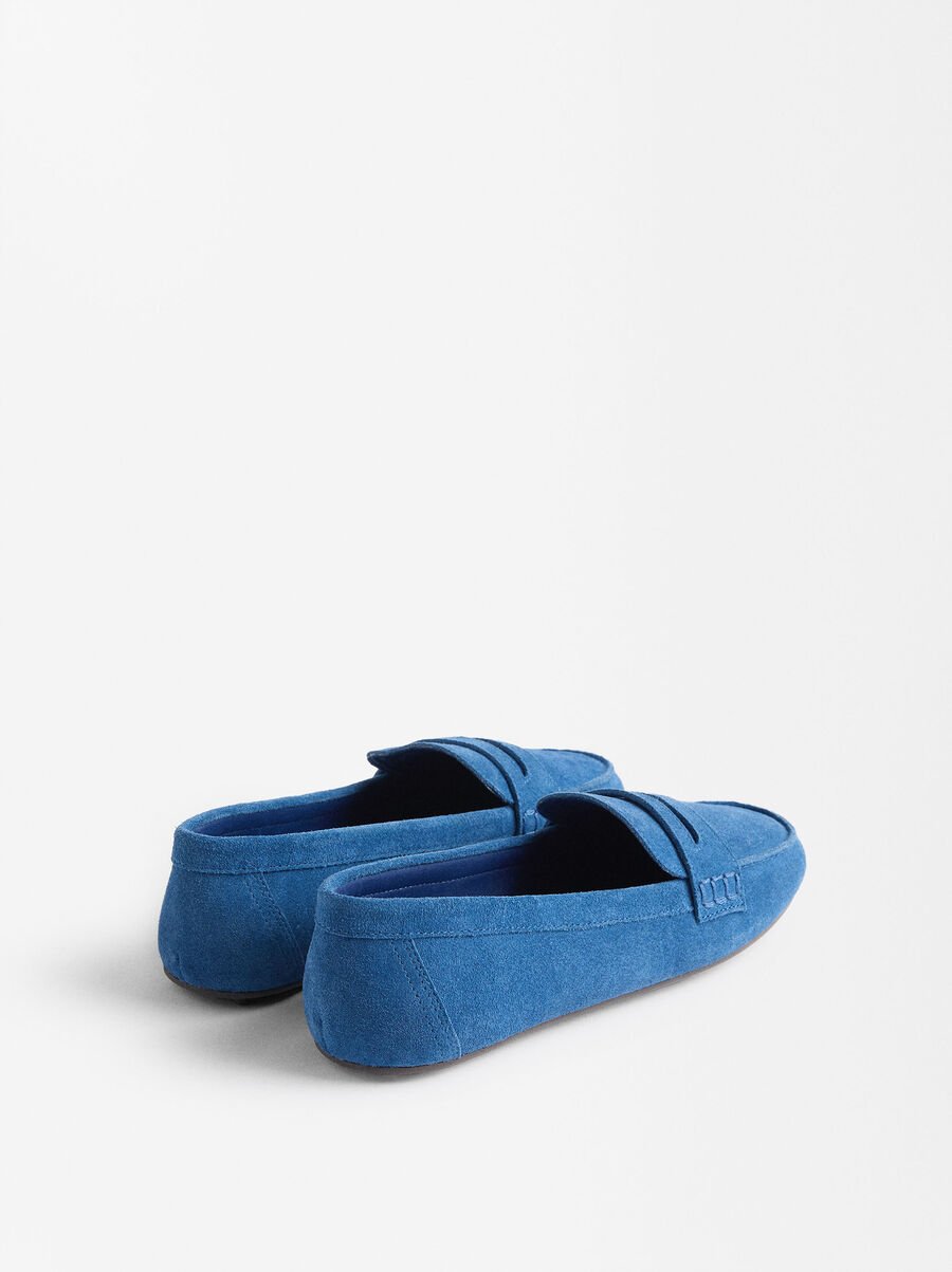 Mocasines de piel con pespuntes