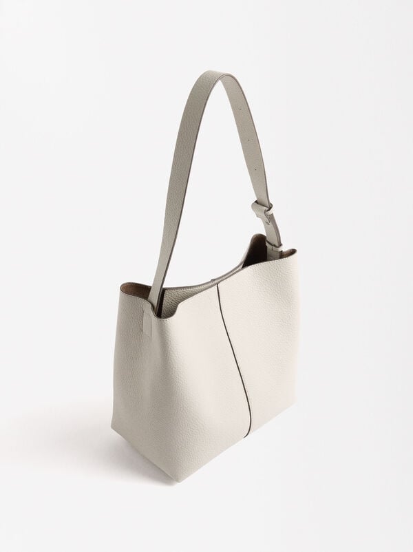 Shoulder bag with removable bag