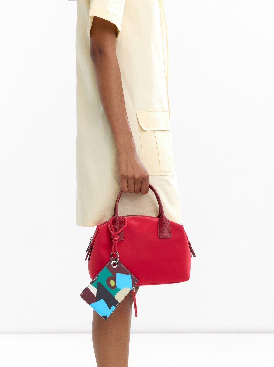 Velvet-textured tote bag with pendant