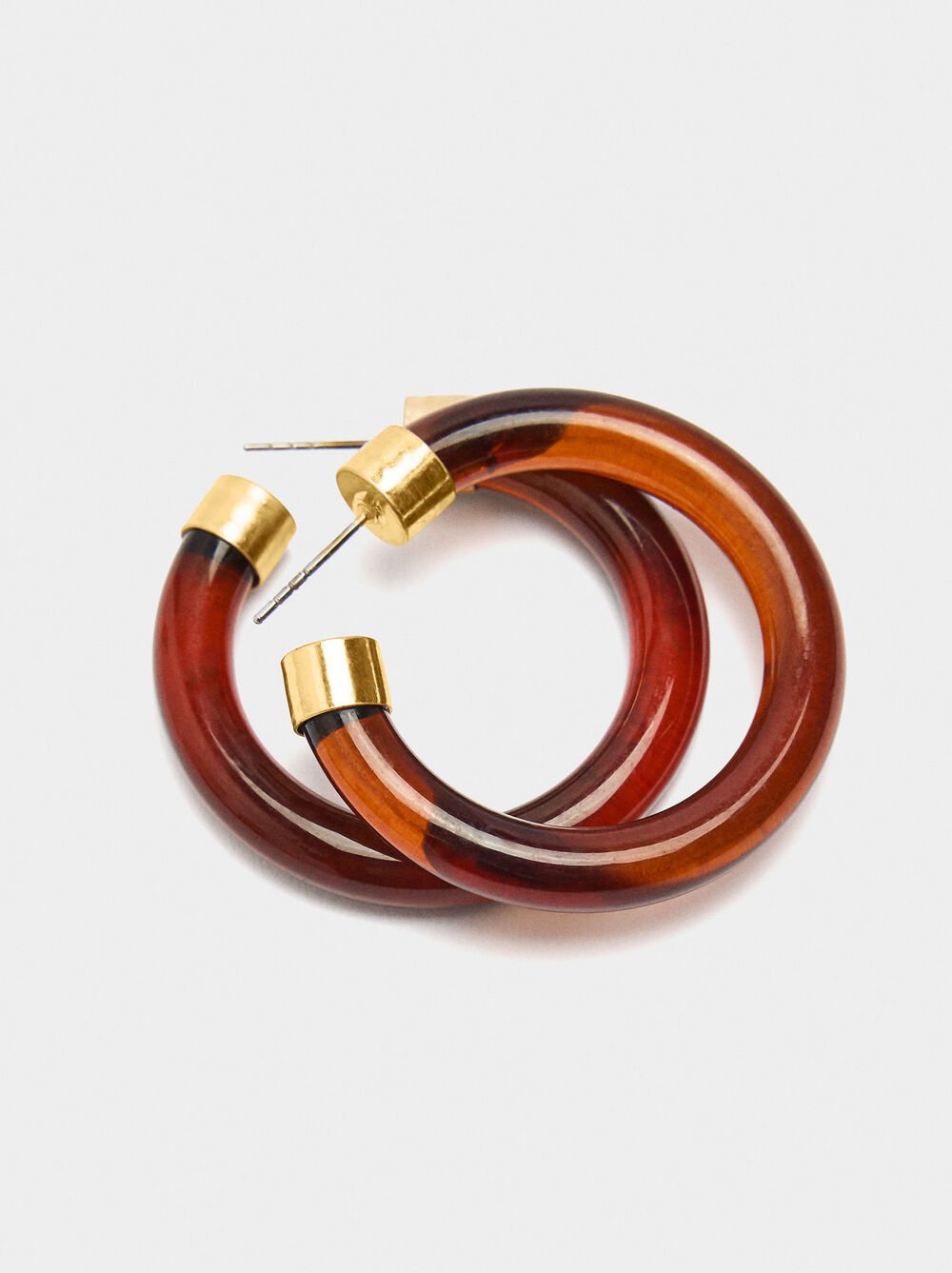 Open hoop earrings with tortoiseshell effect