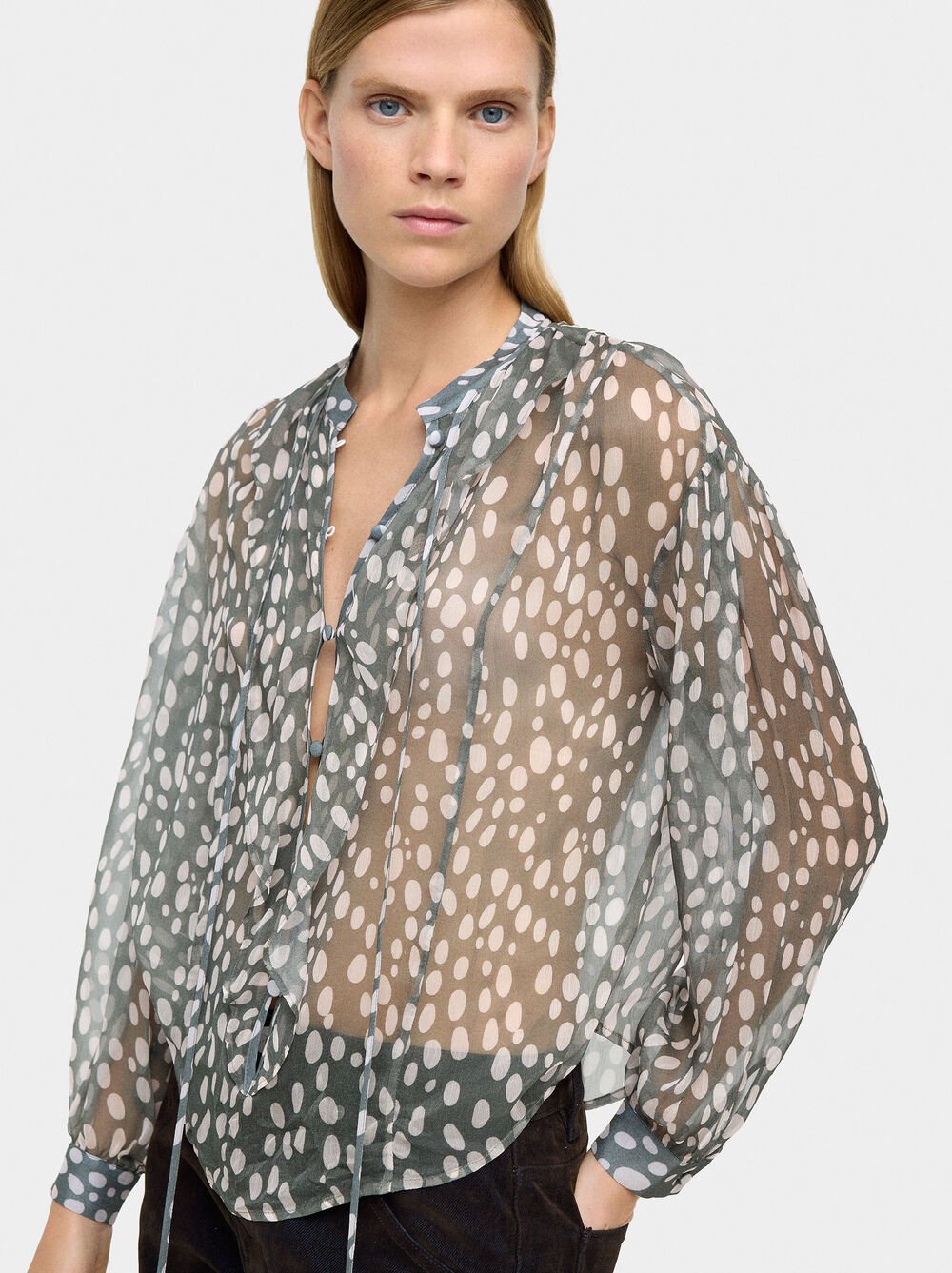 Blusa estampada semitransparente