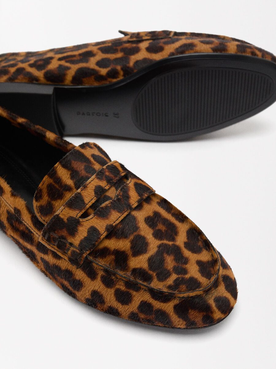 Animal print leather loafers