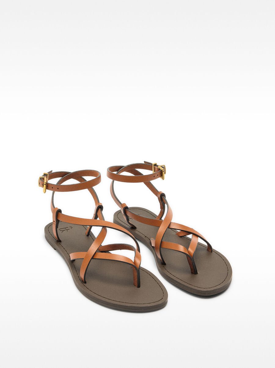 Leather sandals with crossed straps