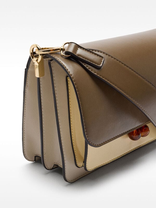 Crossbody bag with flap closure