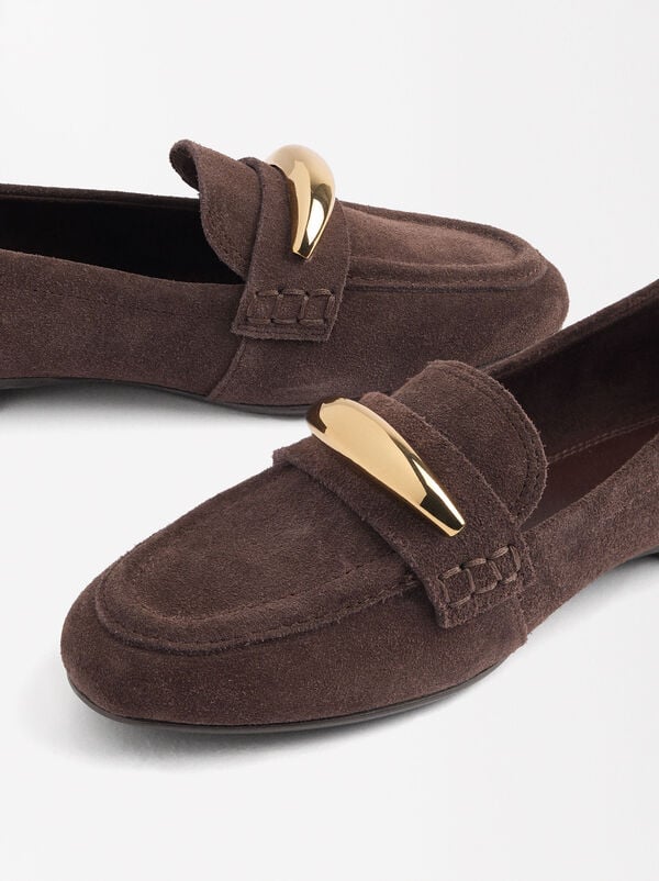 Leather moccasins with metallic detail