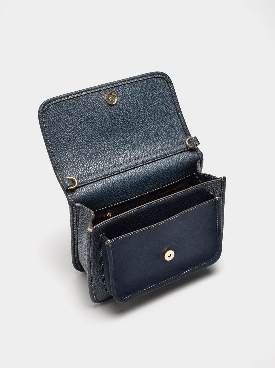 Crossbody bag with texture and flap