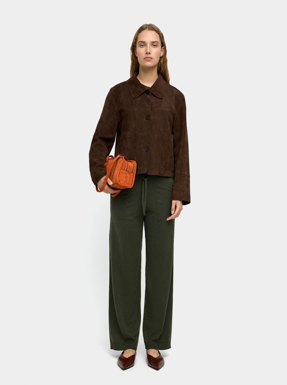Trousers with plain knit