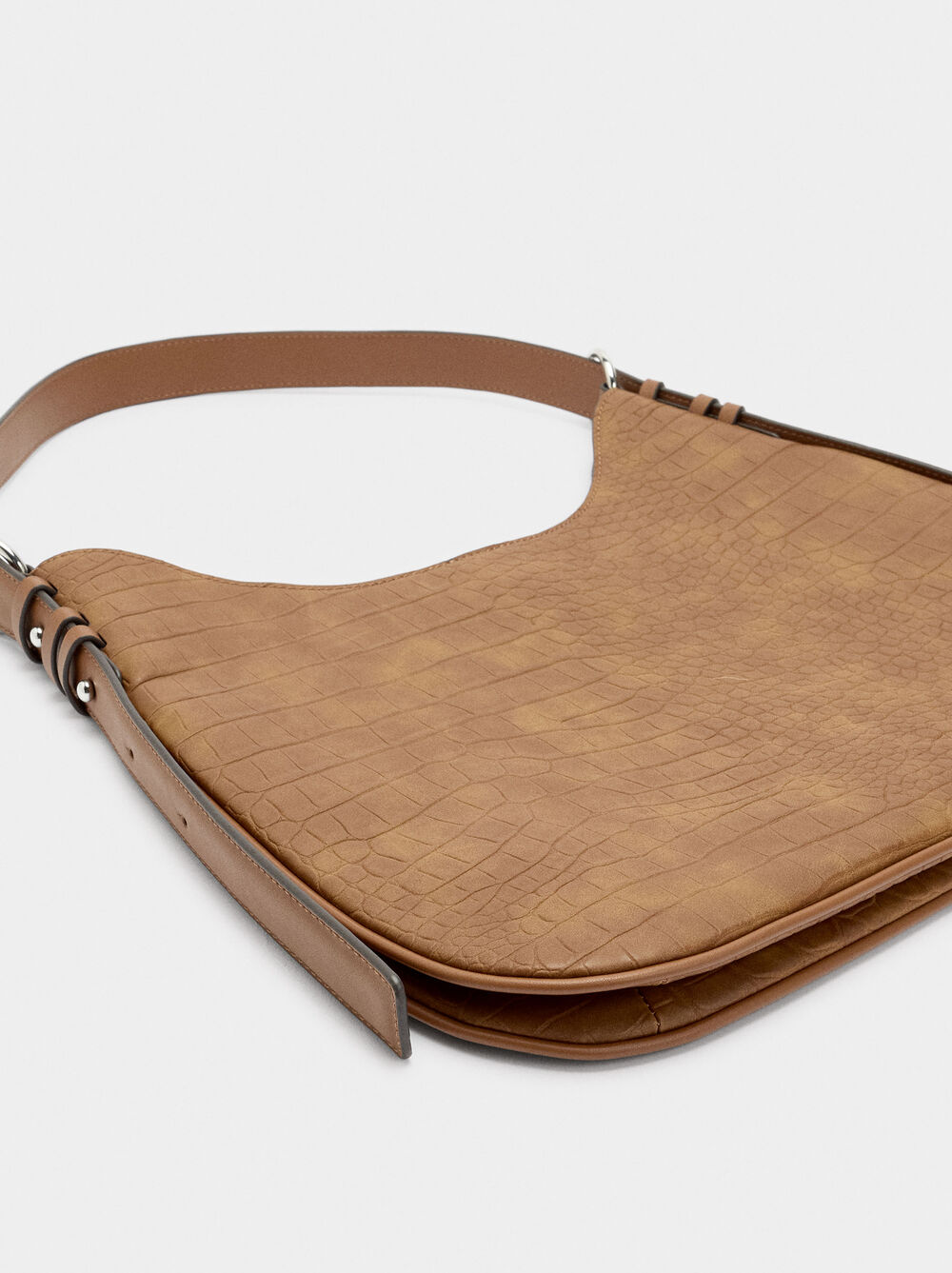 Shoulder bag with animal embossing