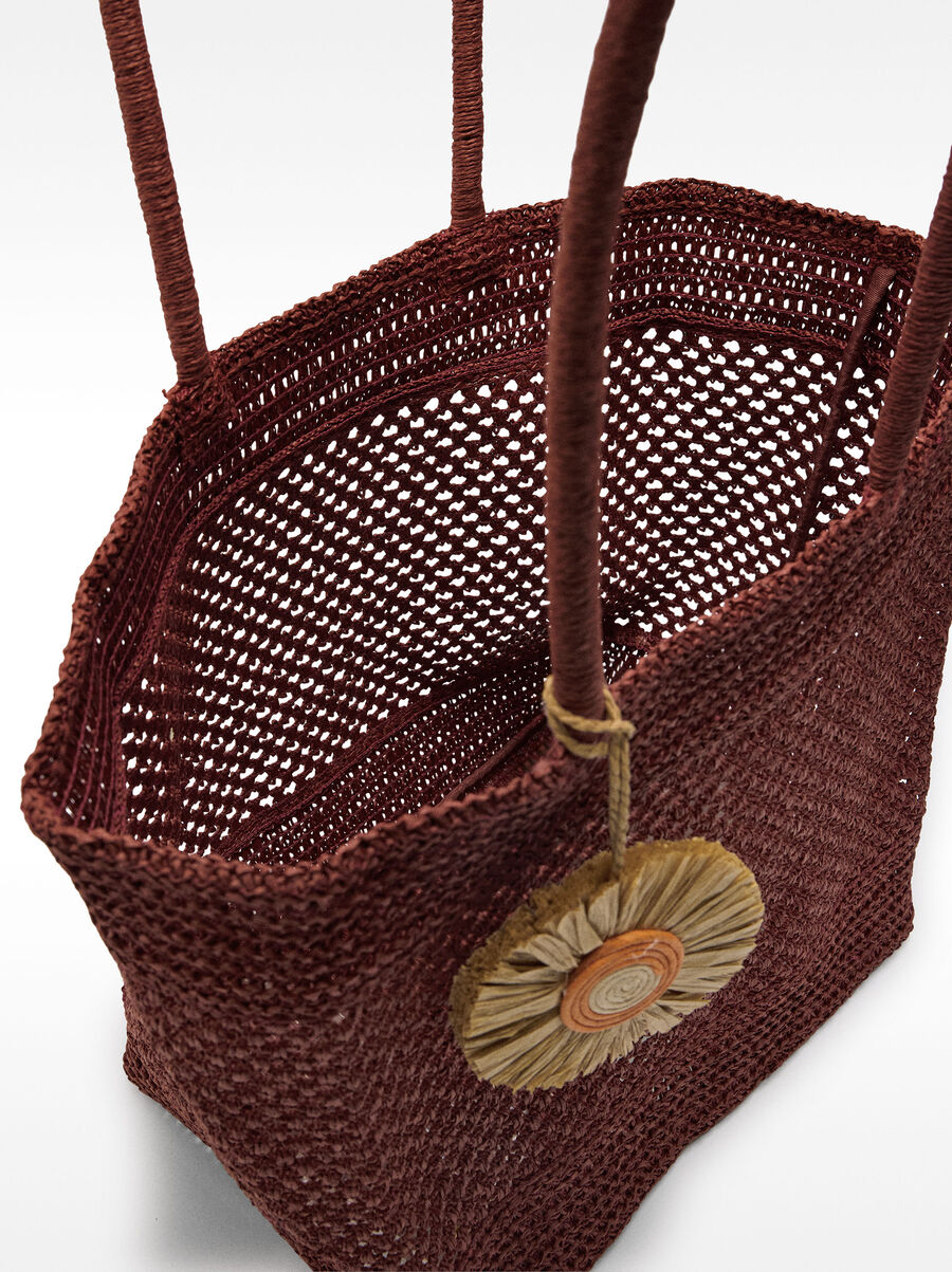 Straw-effect shopper bag with pendant