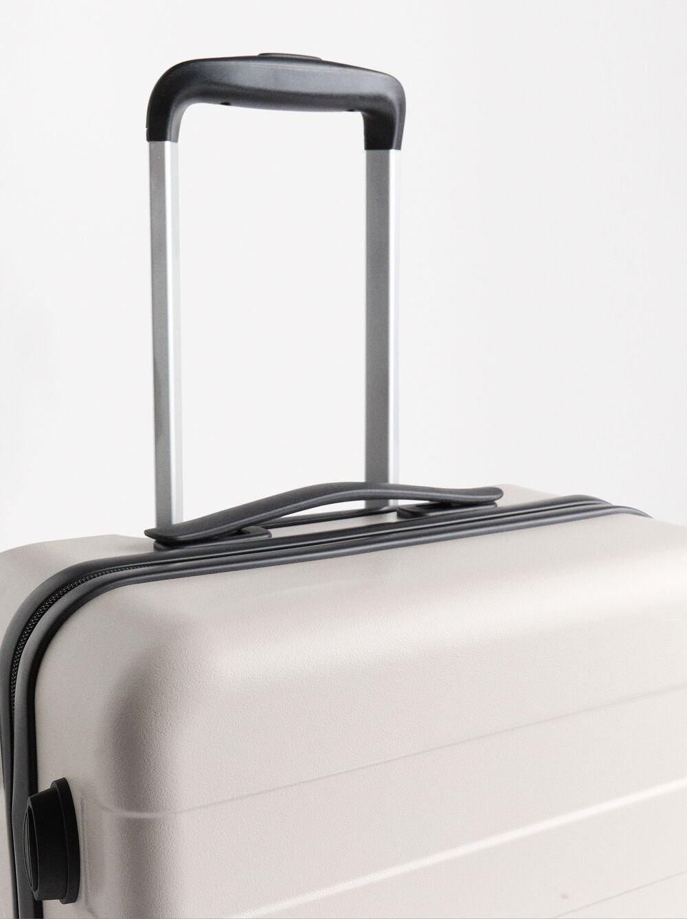 Valise à roulettes avec texture coeur