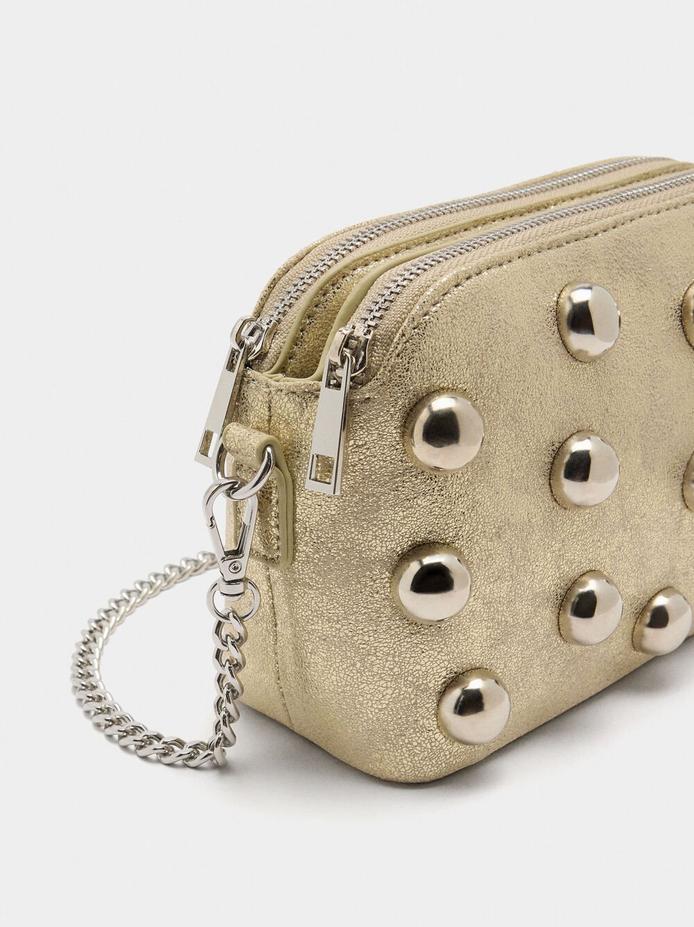 Crossbody bag with metallic spheres