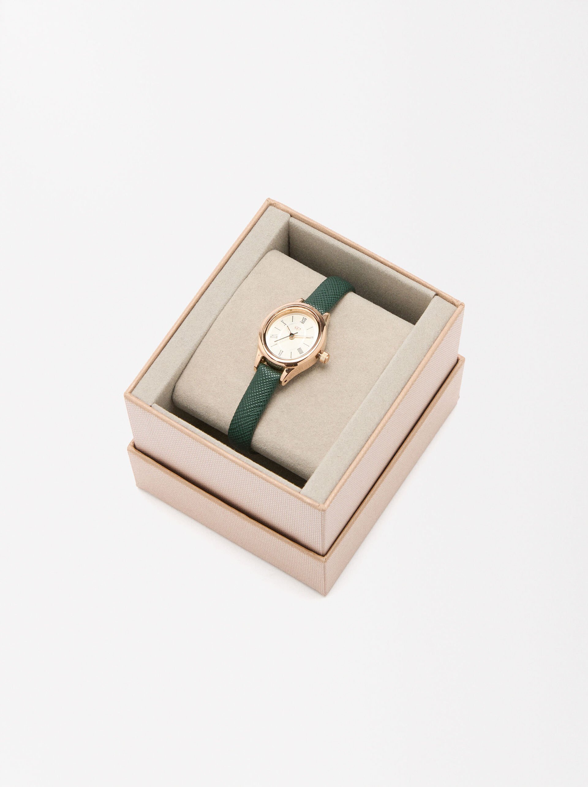 Oval watch with textured strap image number 3.0