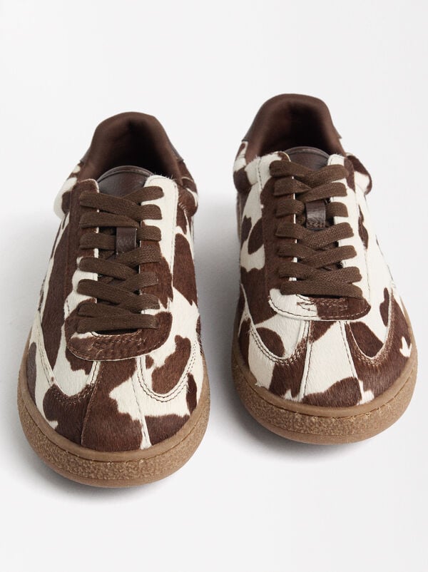 Animal print leather sneakers