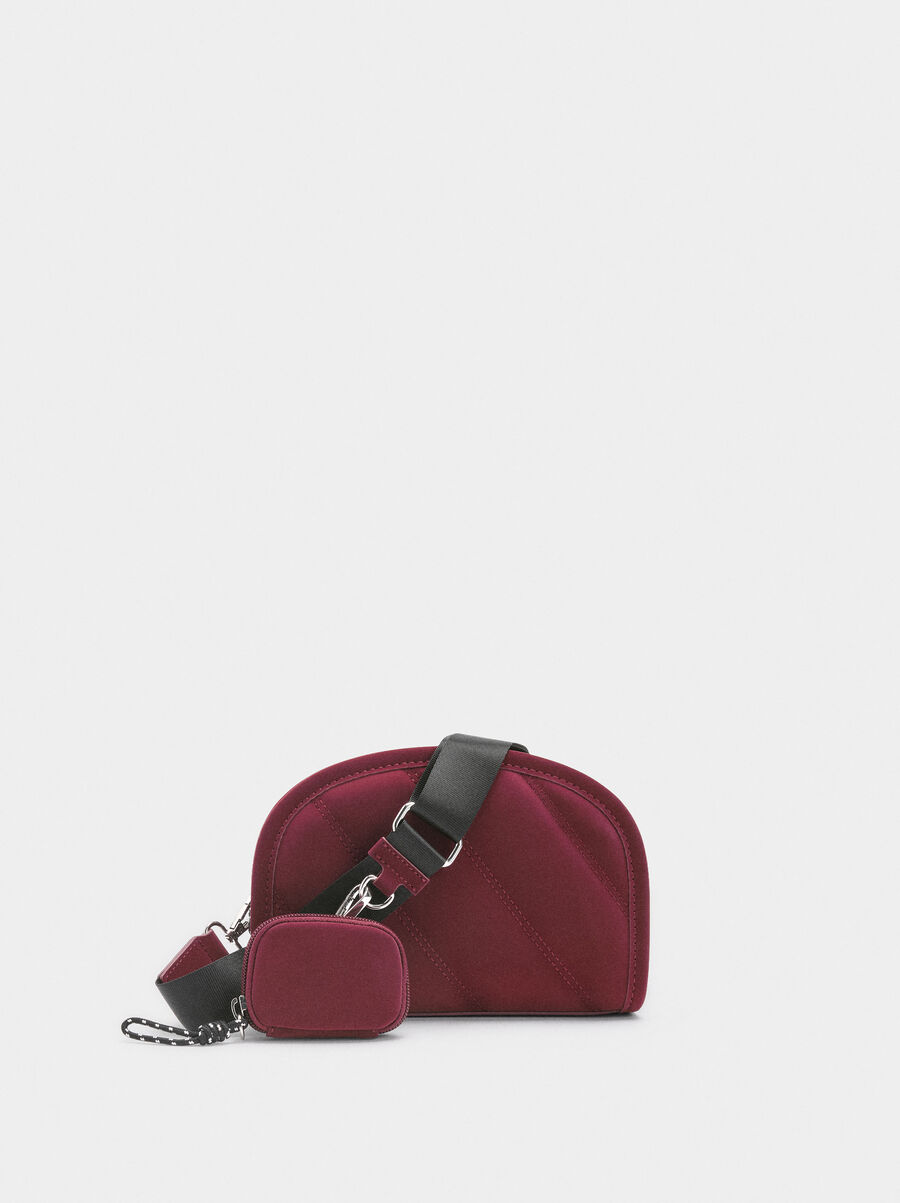 Crossbody bag with soft texture and pendant