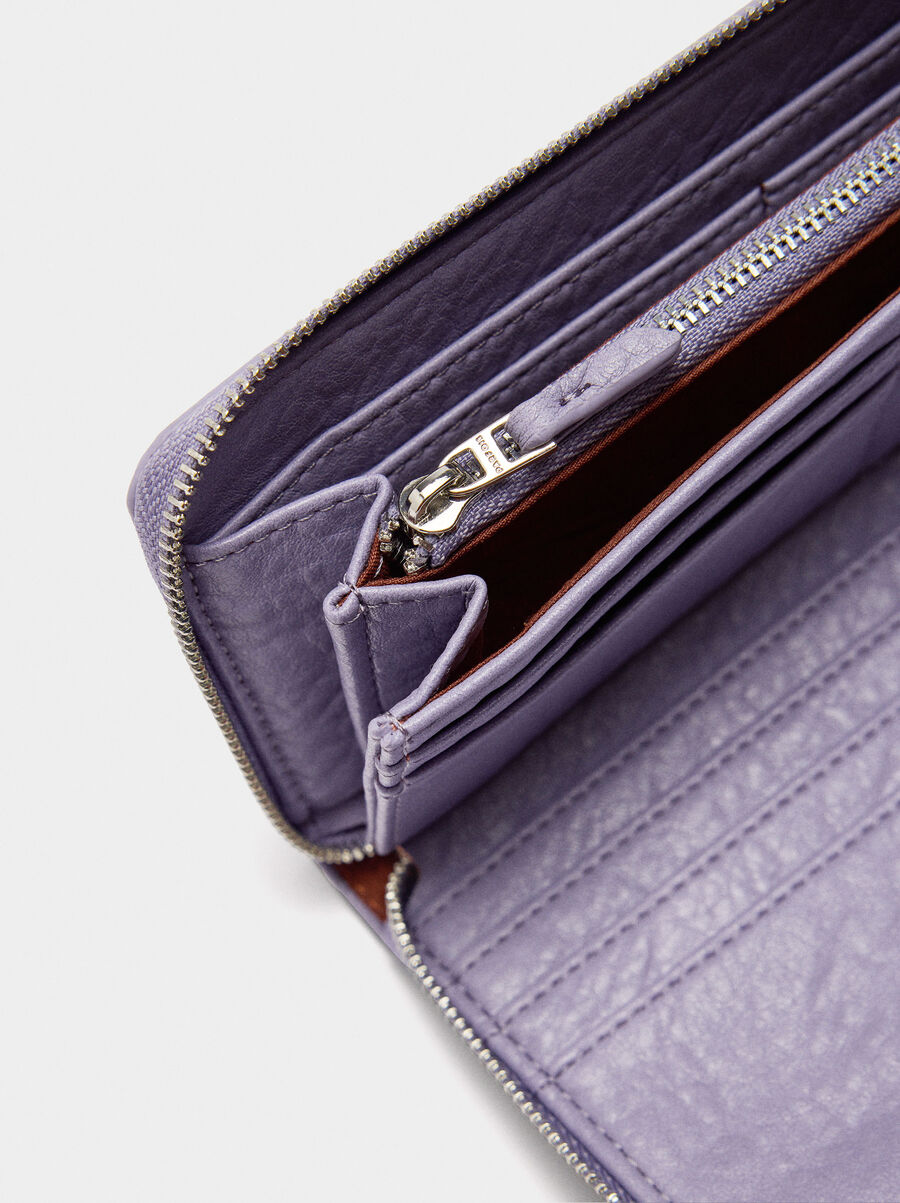 Cartera de textura con cremallera