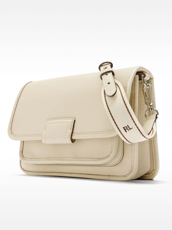 Crossbody bag with texture and flap closure