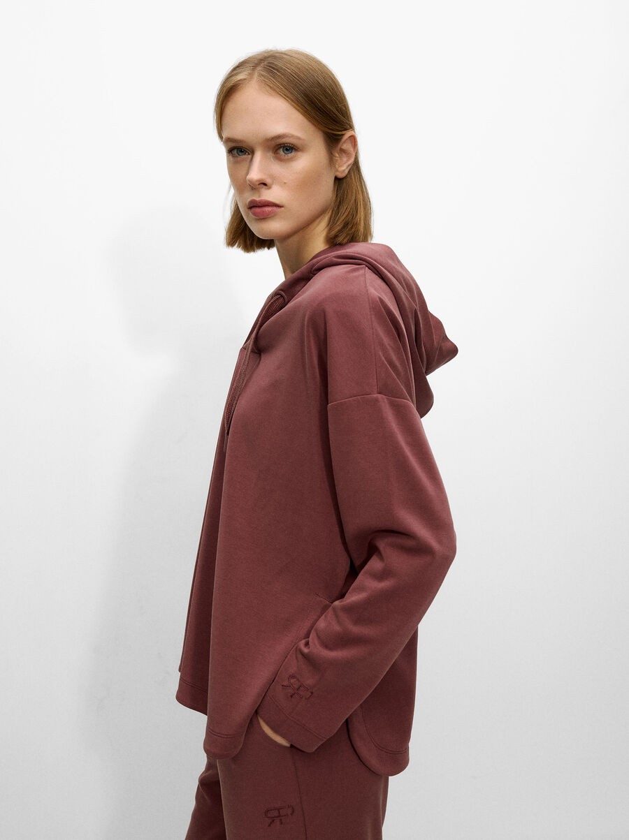 Pull en maille à capuche