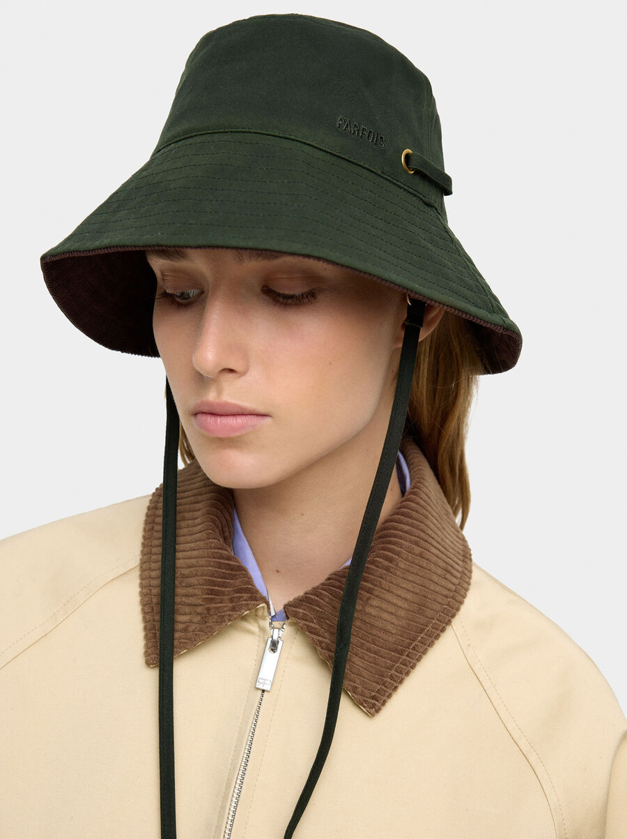 Bucket hat with adjustable strap