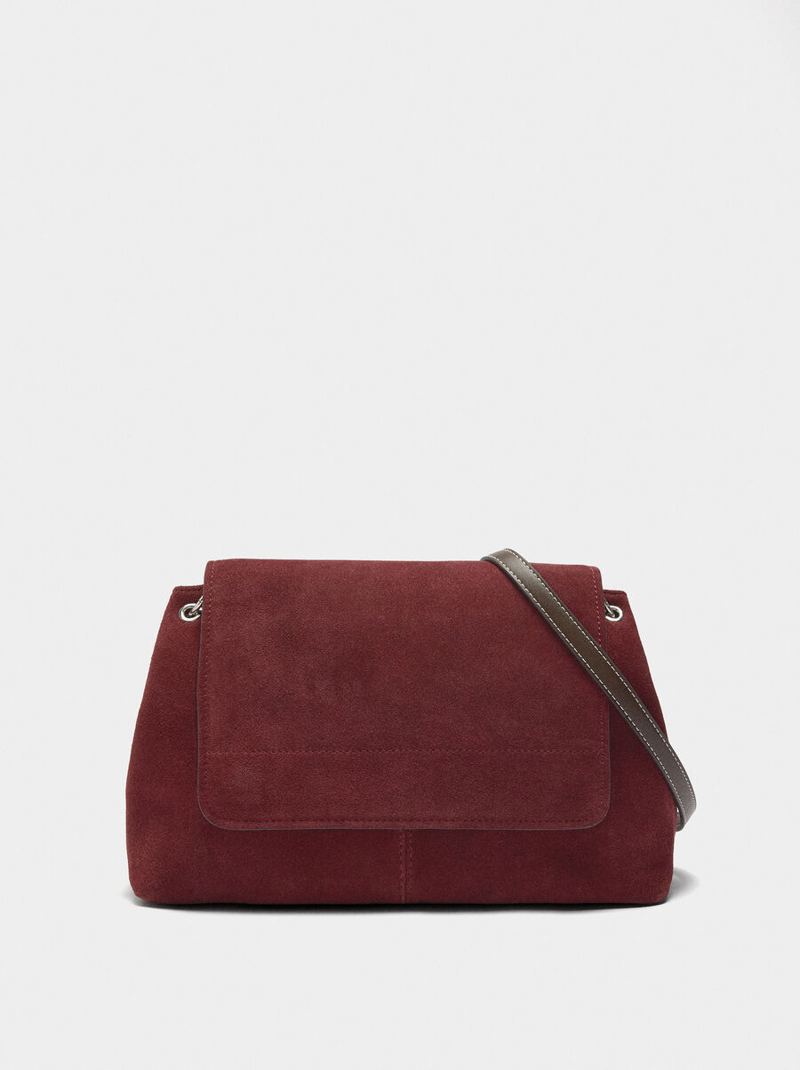 Crossbody bag with leather and flap