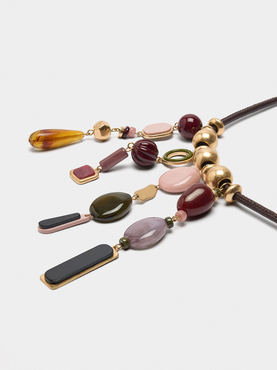 Cord necklace with stone effect pendants