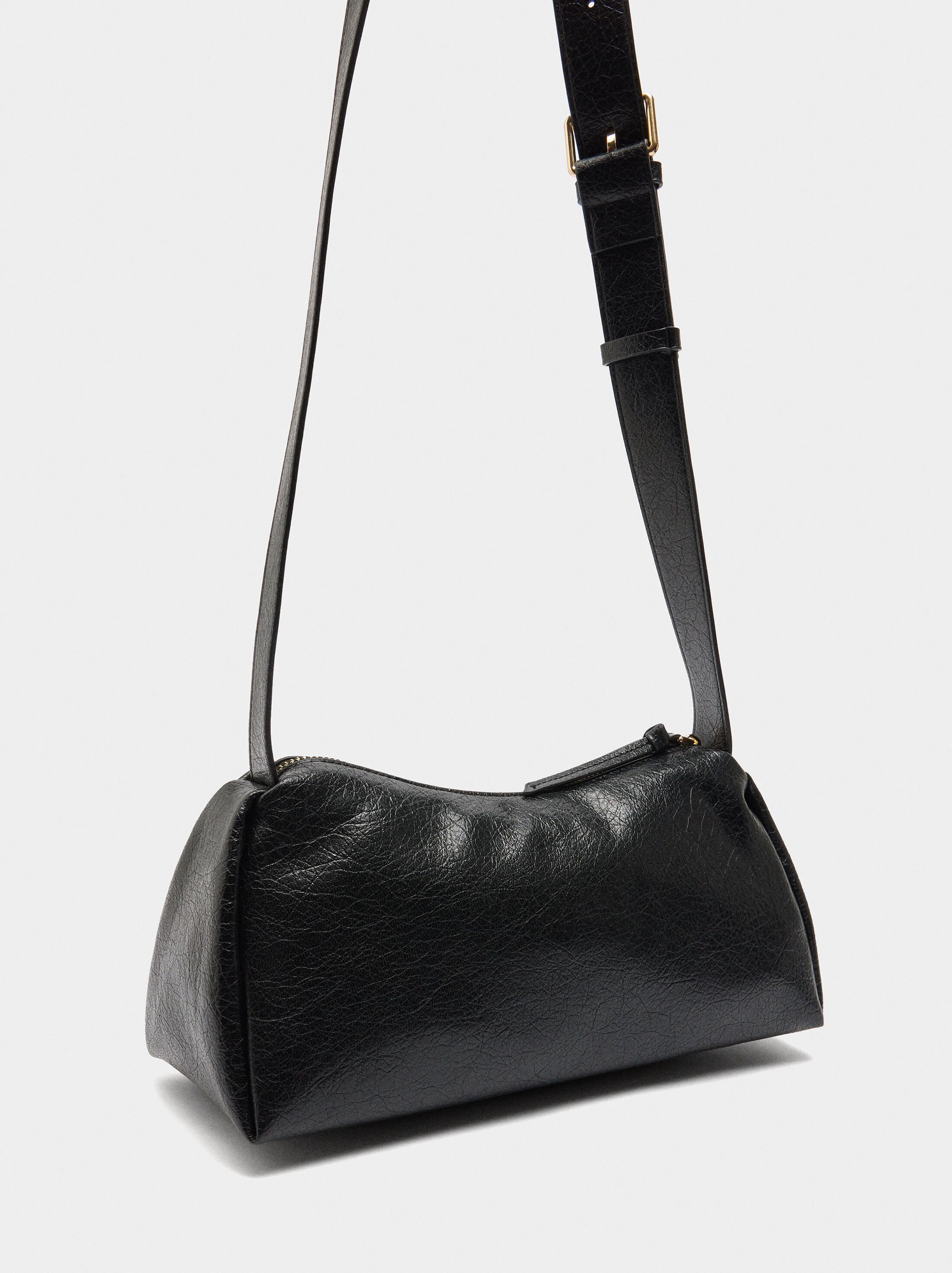 Bossa de bandolera amb efecte clivellat image number 2.0